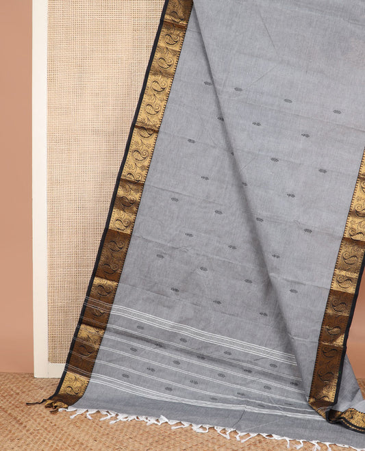 Grey thread buttas Chettinad cotton saree, contrast temple zari black border of paisleys, and striped pallu