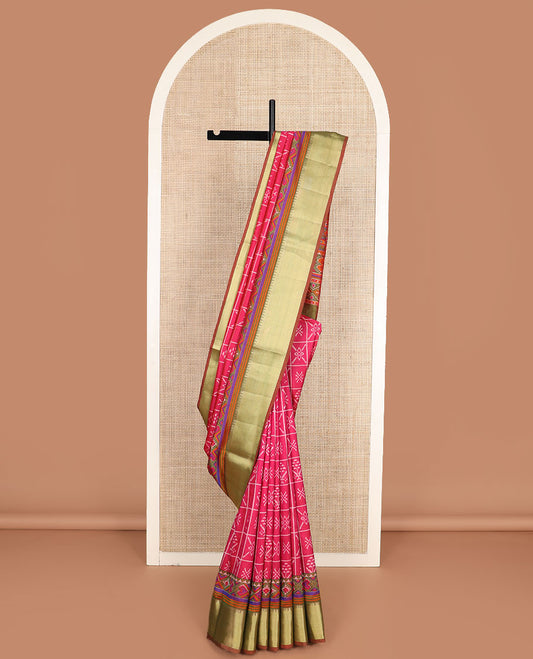 Pink butta enclosed checked semi-banaras patola silk saree, contrast zari border of ikkat design, and pallu steeped with geometric patterns