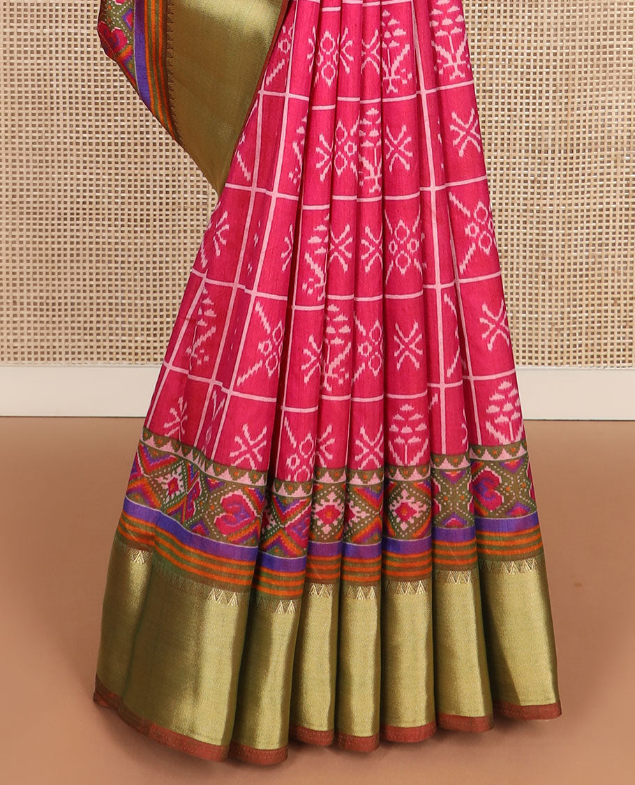 Pink butta enclosed checked semi-banaras patola silk saree, contrast zari border of ikkat design, and pallu steeped with geometric patterns