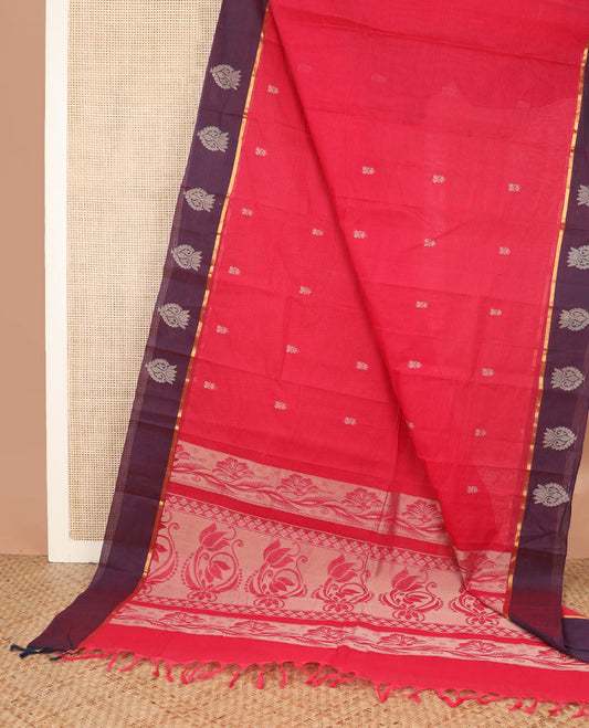 Red buttas kanchi cotton saree, contrast border, and pallu of floral designs