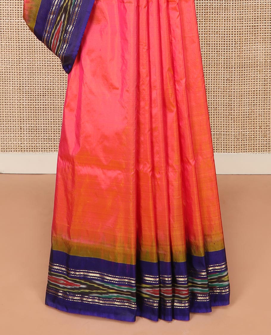 Dark Peach Plain Ikkat Silk Saree with a Contrast Rani Pink Border Accentuated by a Hazy Ikkat Weave, Featuring a Pallu Flanked by Stripes and Ikkat Texture