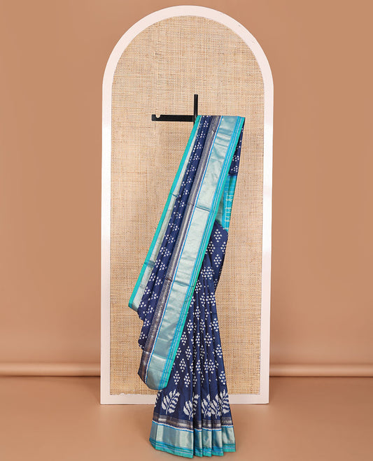 Blue ikkat saree with buttas, contrast zari border & pallu of ikkat design & stripes