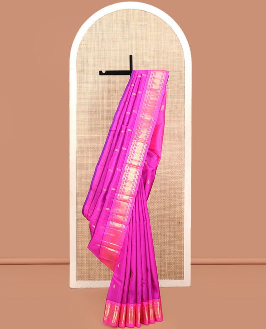 Pink Kanchipuram Silk Saree, Accentuated with Zari Buttas, a Semi-Contrast One-Sided Border of Rekku, Banaras, and Mayil Kan, Zari Design Pallu, and No Blouse
