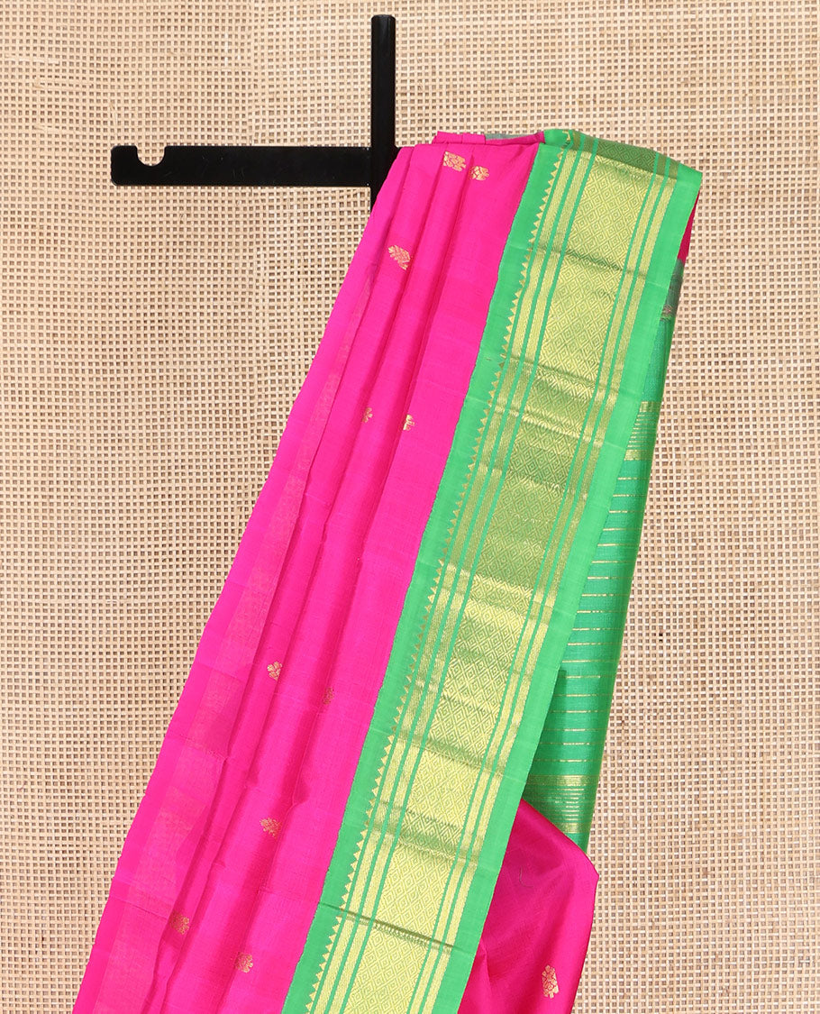 Pink Kanchipuram Silk Saree, Spotlighted with Zari Buttas on Its Body, Complemented by a Contrast One-Sided Korvai Border of Rekku, Banaras, and Mayil Kann Designs, Pallu Steeped with Zari Designs, and Comes Without a Blouse