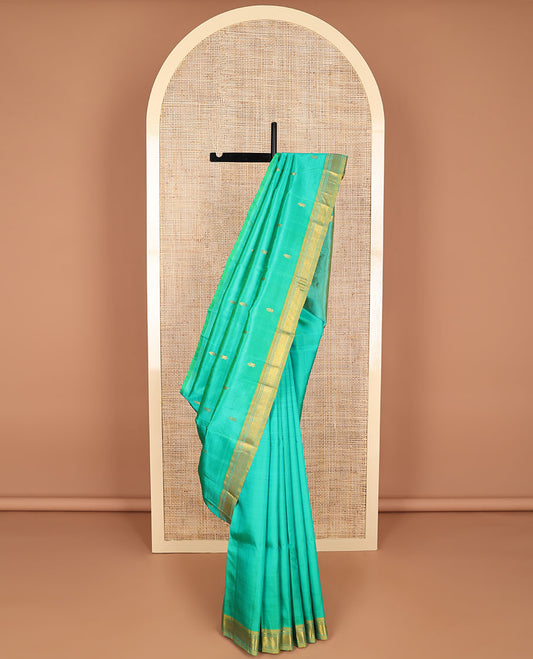 Sea blue buttas kancheepuram silk saree with contrast intricate zari design border & floral zari design pallu
