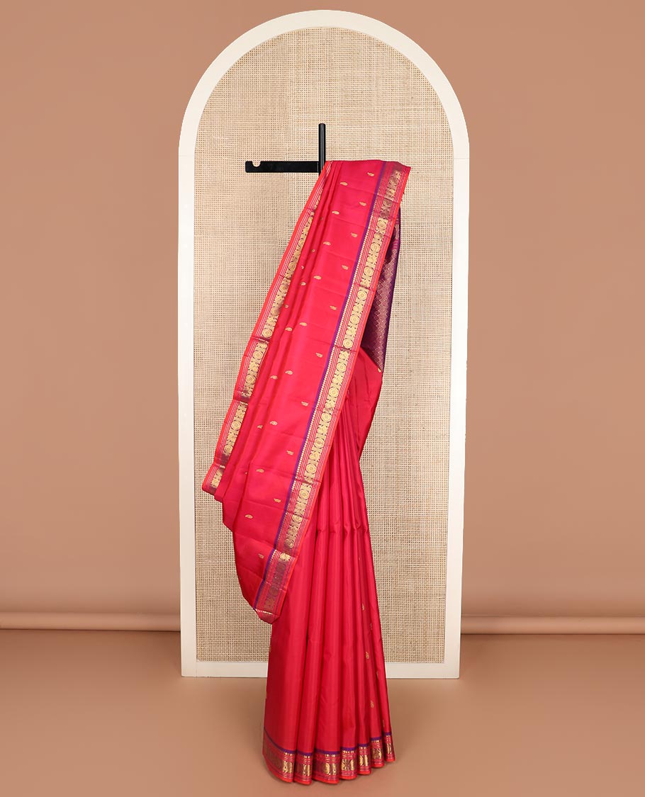 Red zari buttas Kanchipuram silk saree, contrast border of manga, neli, annam and chakram designs, and poun and diamond motifs steeped pallu