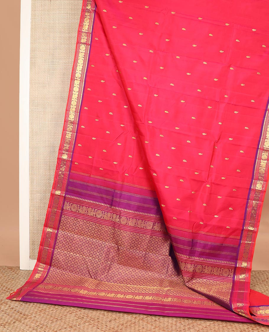 Red zari buttas Kanchipuram silk saree, contrast border of manga, neli, annam and chakram designs, and poun and diamond motifs steeped pallu