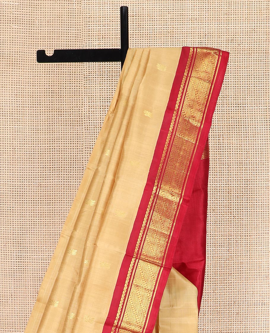 Sandal Kanchipuram Silk Saree Sparsely Sparkled with Zari Buttas All Over Its Body, Complemented by a Contrast One-Sided Korvai Border of Traditional Designs, Pallu of Zari Designs, and Comes Without a Blouse
