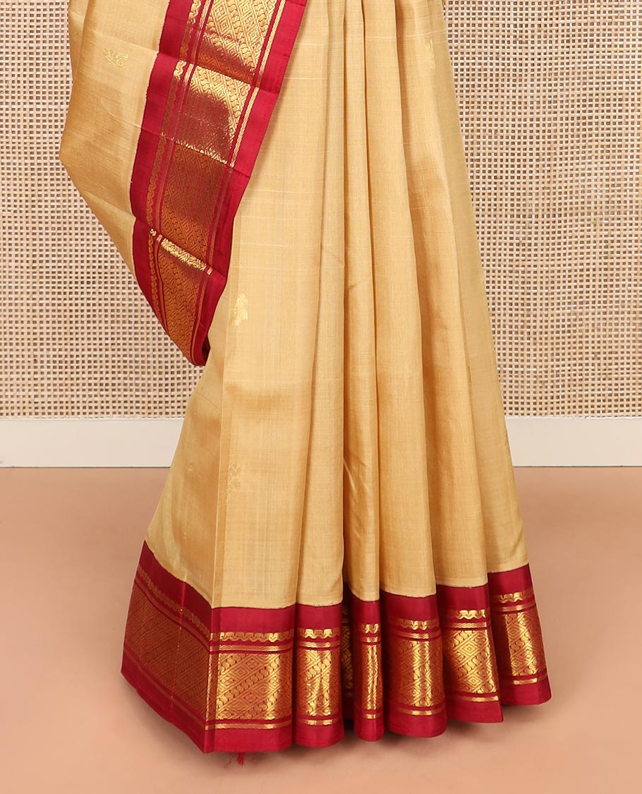Sandal Kanchipuram Silk Saree Sparsely Sparkled with Zari Buttas All Over Its Body, Complemented by a Contrast One-Sided Korvai Border of Traditional Designs, Pallu of Zari Designs, and Comes Without a Blouse