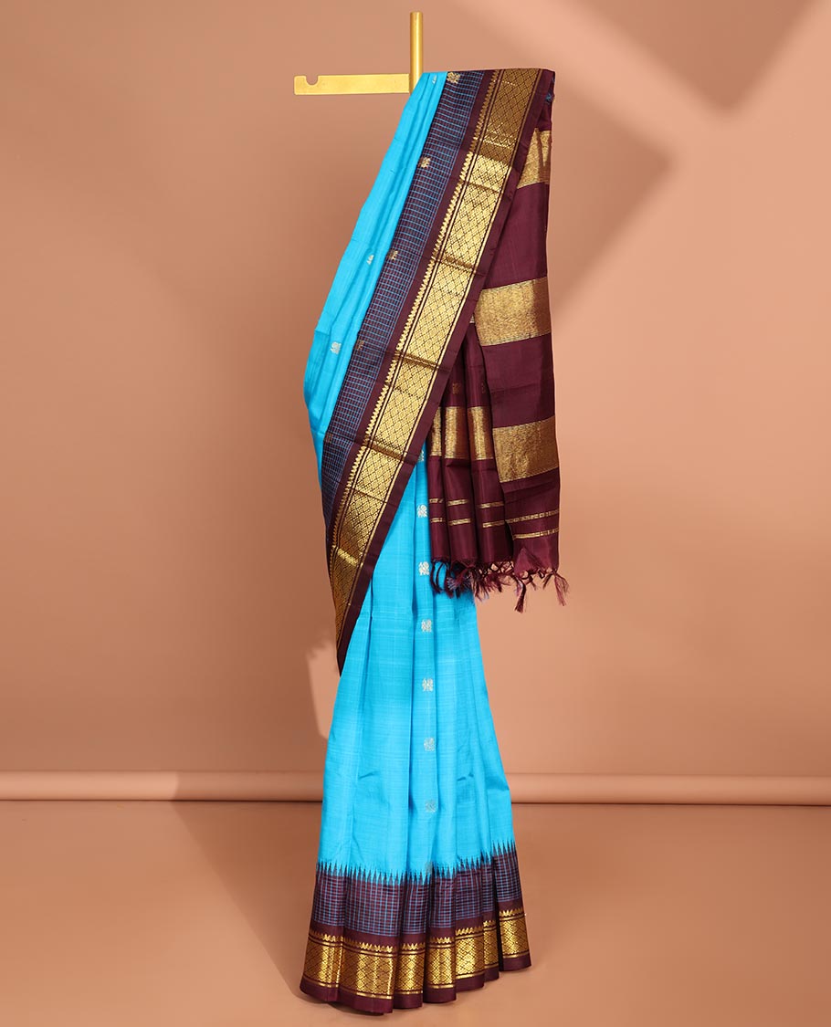 Blue peacock buttas kancheepuram silk saree with contrast border of thilakam mokku, banaras,jaal design & zari design pallu