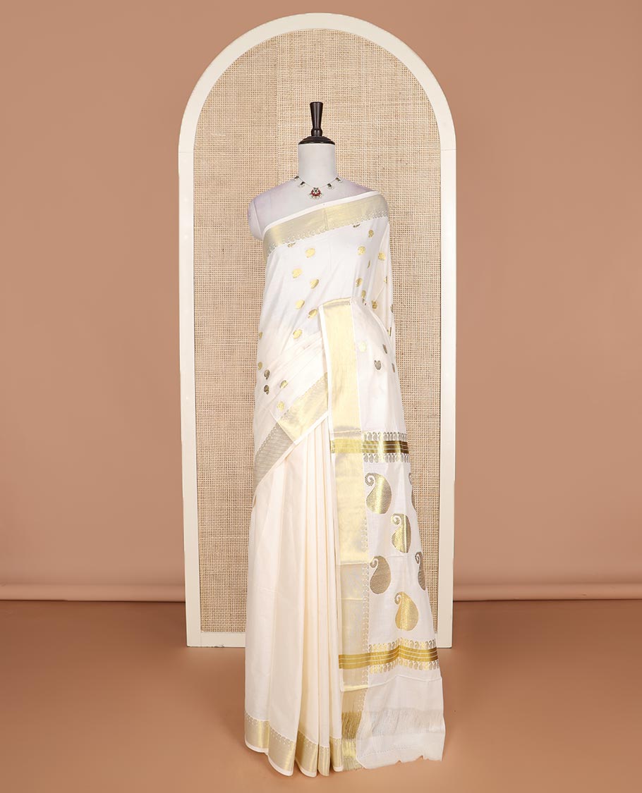 Cream paisley zari buttas Kerala cotton saree, paisley zari border, and zari paisley pallu