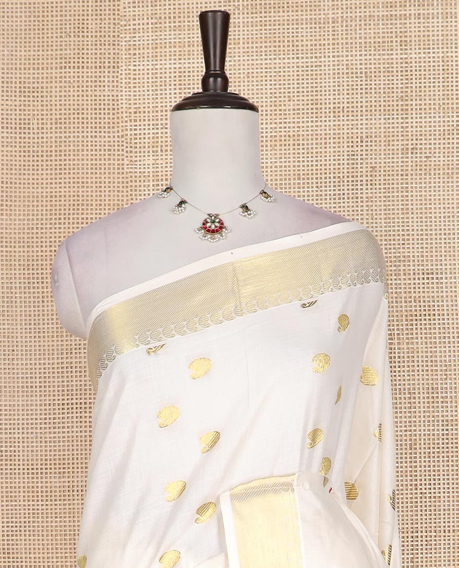 Cream paisley zari buttas Kerala cotton saree, paisley zari border, and zari paisley pallu