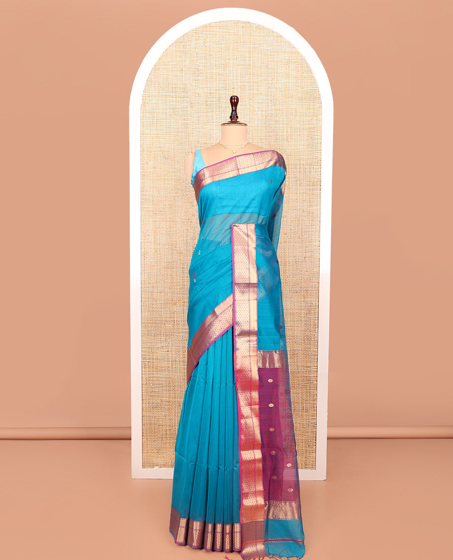 Blue Maheshwari Cotton Saree, Dazzled with Flower Buttas All Over Its Body, Complemented by a Contrast Zari Traditional Design Border, Pallu Steeped with Flower Buttas, and Paired with a Contrast Blouse