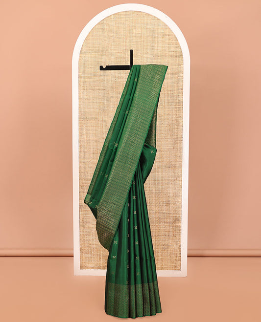 Green Mayuri Soft Silk Saree, Embellished with Zari Buttas All Over Its Body, Highlighted by Zari Border of Kamalam Designs, Pallu of Intricate Designs, and Paired with a Matching Blouse