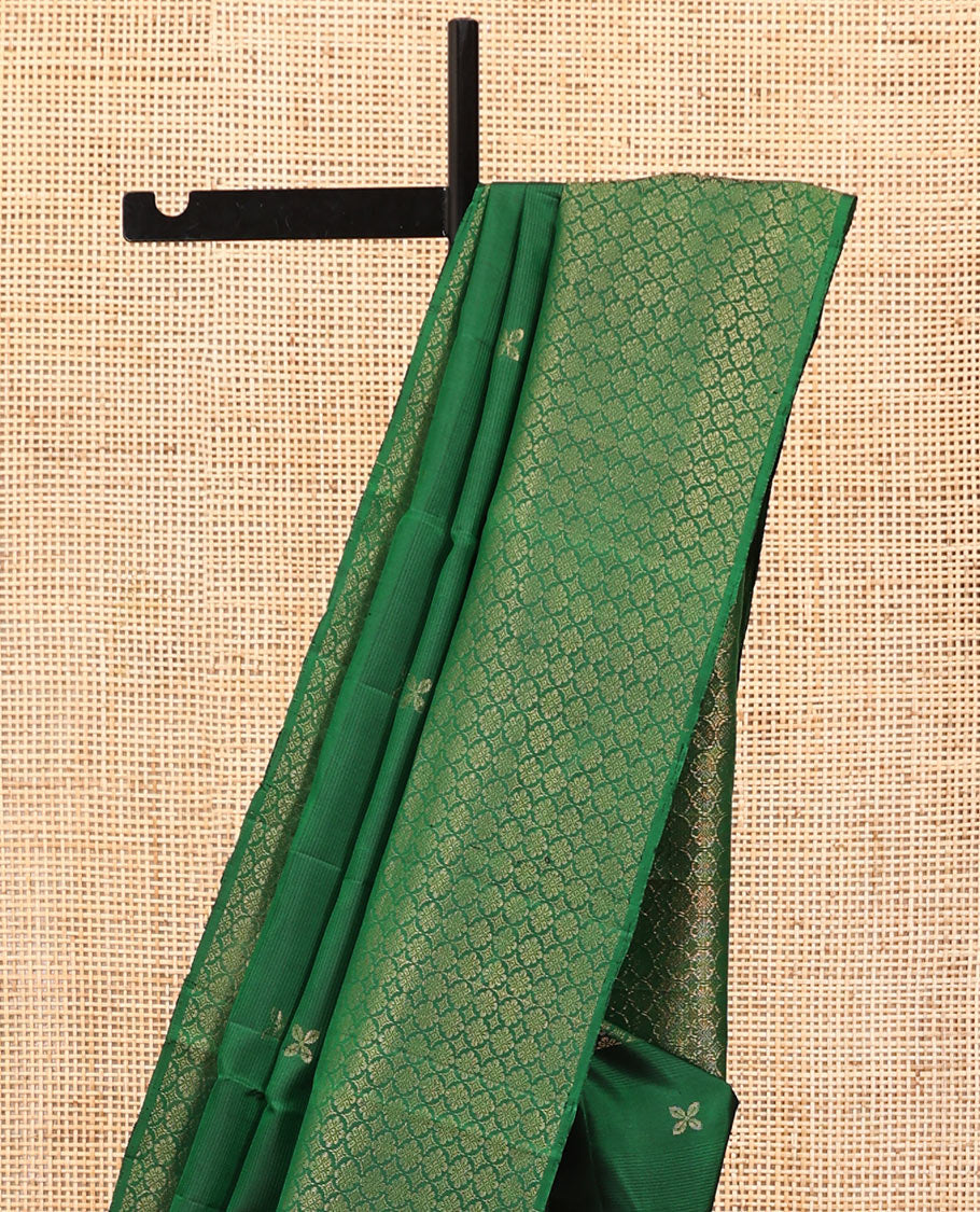 Green Mayuri Soft Silk Saree, Embellished with Zari Buttas All Over Its Body, Highlighted by Zari Border of Kamalam Designs, Pallu of Intricate Designs, and Paired with a Matching Blouse