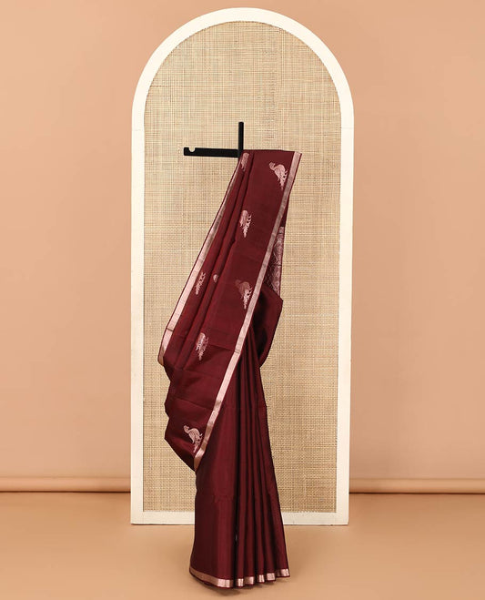 Maroon mayil motifs zari woven soft silk saree, zari piping border, and ogee patterned pallu