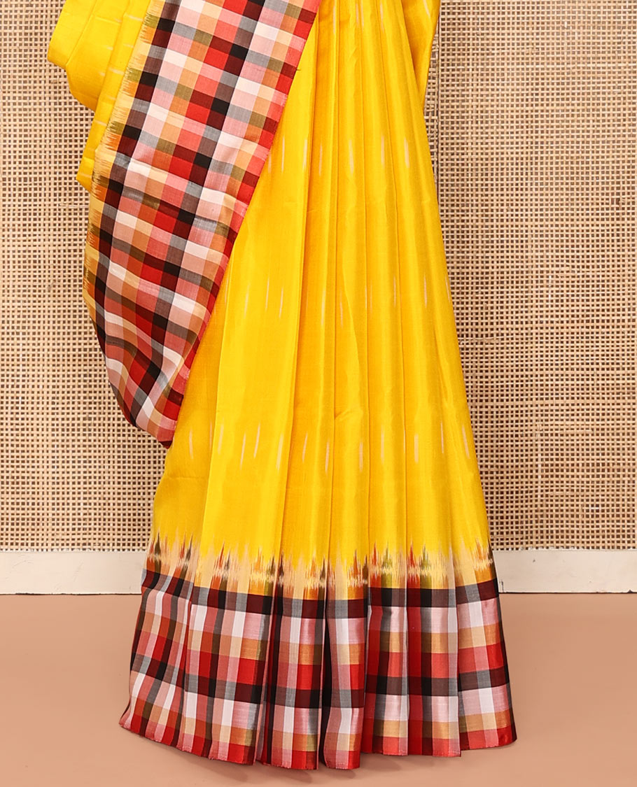Yellow Mayuri Soft Silk Saree, Sparsely Sparkled with Ikkat Buttas All Over Its Body, Complemented by Contrast Checked Border, Artfully Ikkat Textured Pallu, and Paired with a Contrast Blouse