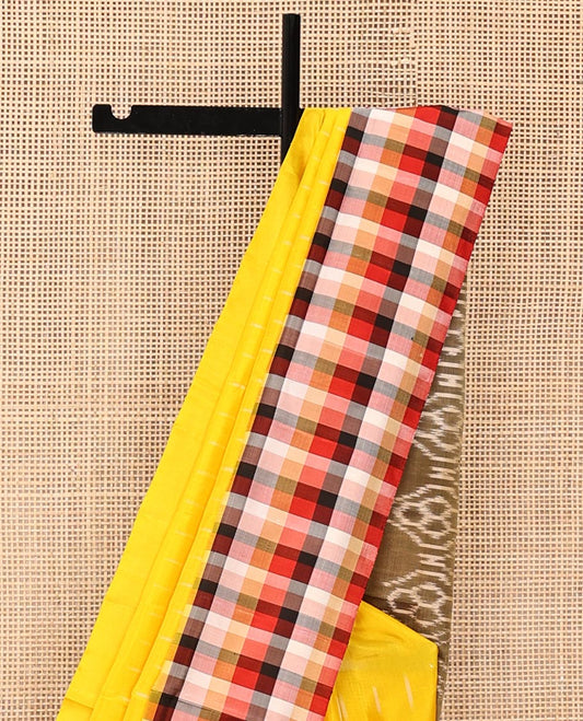 Yellow Mayuri Soft Silk Saree, Sparsely Sparkled with Ikkat Buttas All Over Its Body, Complemented by Contrast Checked Border, Artfully Ikkat Textured Pallu, and Paired with a Contrast Blouse