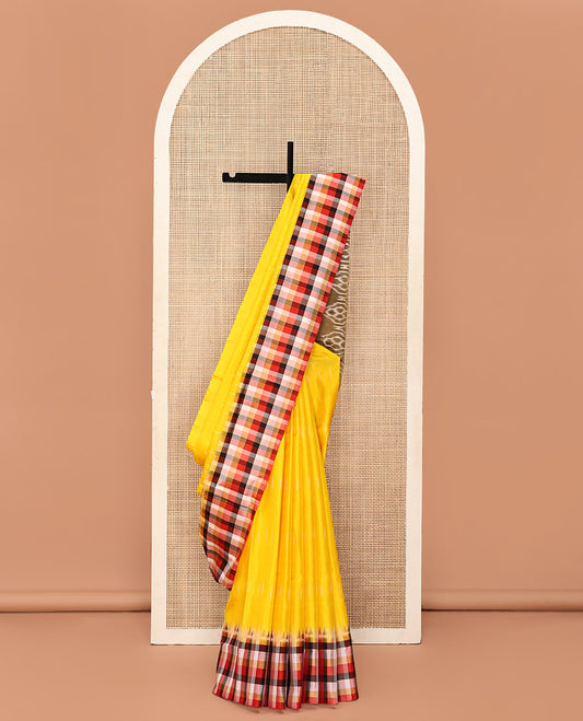 Yellow Mayuri Soft Silk Saree, Sparsely Sparkled with Ikkat Buttas All Over Its Body, Complemented by Contrast Checked Border, Artfully Ikkat Textured Pallu, and Paired with a Contrast Blouse