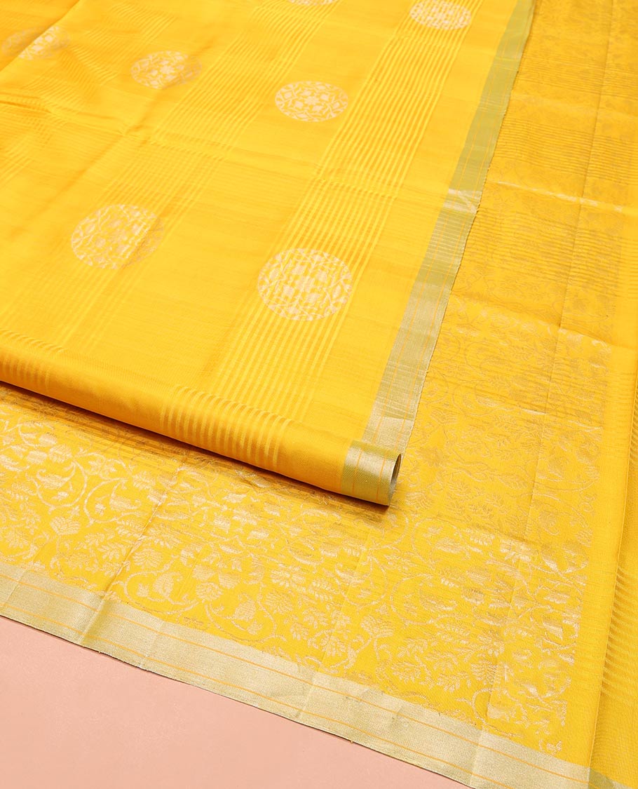 Yellow Mayuri Soft Silk Saree, Bedecked with Stripes and Buttas on Its Body, Subtle Zari Piping Border, Pallu Features Floral Jaal Designs, and Paired with a Matching Blouse