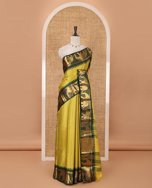 Liril Green checked semi-tafeta saree, contrast temple zari elephant motifs border, striped pallu & matching checked zari border blouse