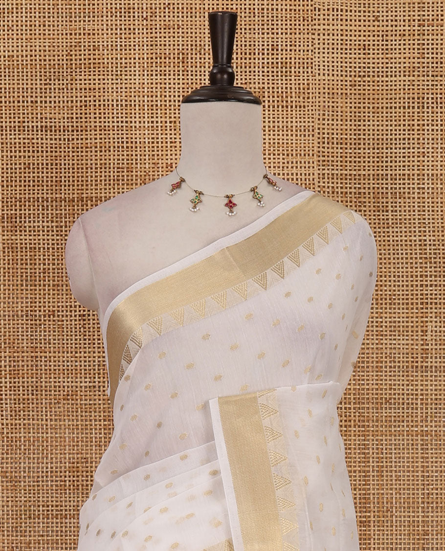 Cream zari buttas Mercerised cotton saree, traditional zari temple border, zari striped pallu & small gold butta blouse