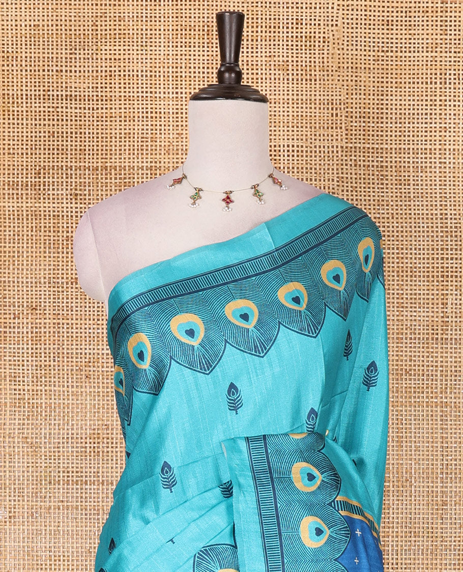 Green peacock feathers motifs printed katan silk saree, peacock feathers printed border, contrast Radha Krishna stories printed pallu, and contrast printed blouse