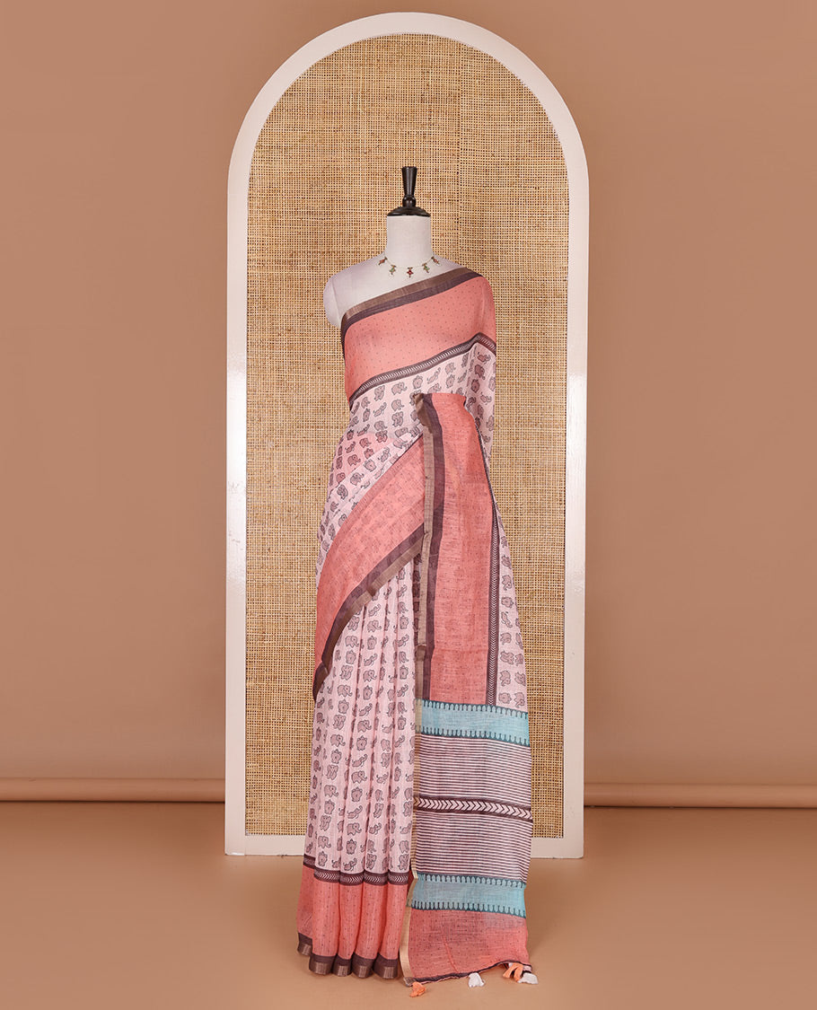 Pastel pink cute elephant motifs printed linen cotton saree, contrast chevron border, pallu of stripes and chevron, and contrast printed blouse