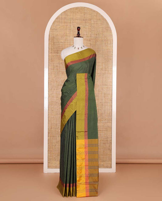 Olive green-mehendi green plus-shaped buttas steeped semi-soft silk saree, contrast satin border of stripes, striped pallu, and contrast blouse