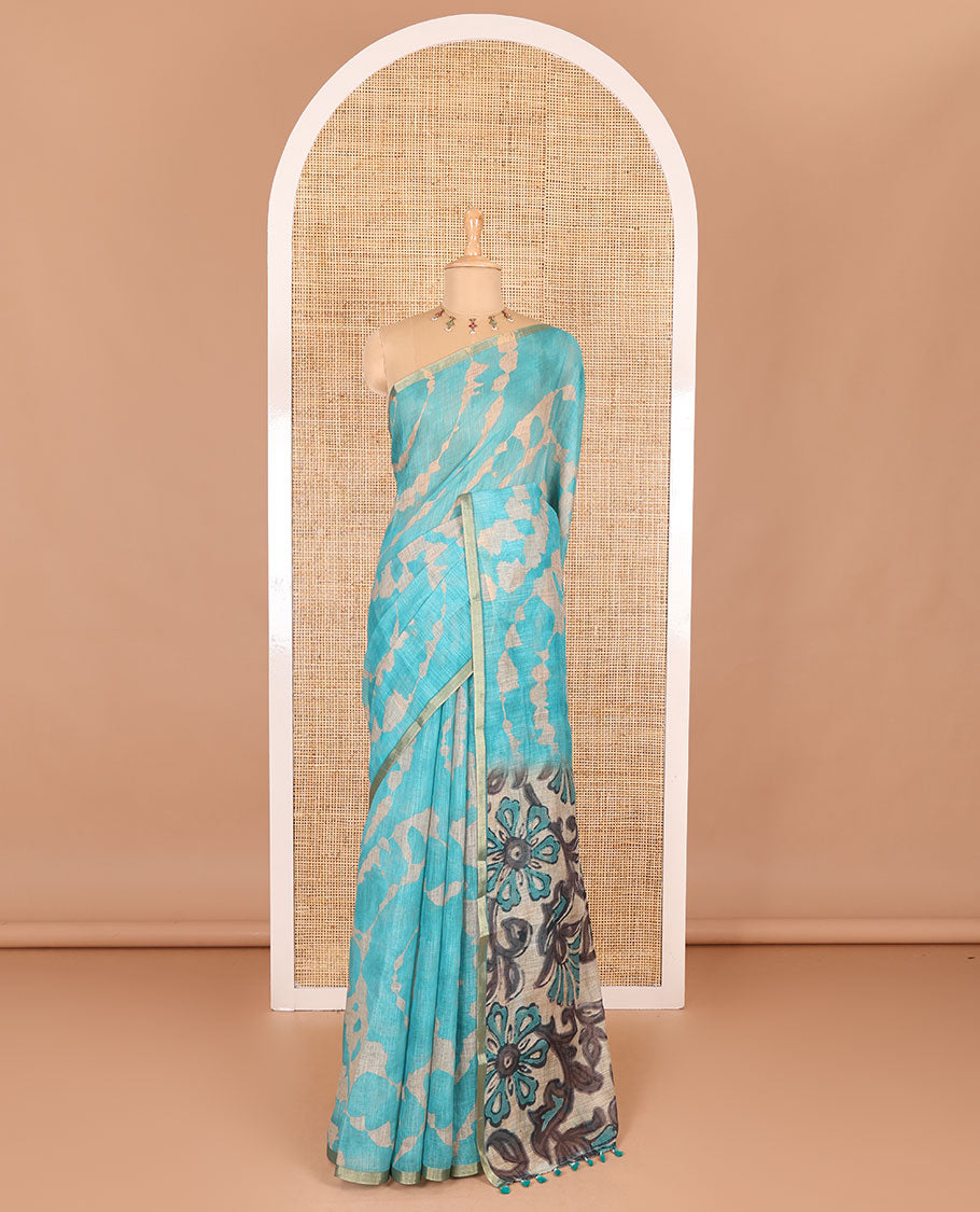 Borderless rama blue batik printed linen cotton saree, hand brush painting style floral vine printed pallu, and contrast floral printed blouse