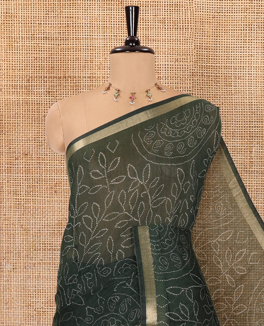 Green bandhani-style floral and chakra printed saree, zari piping border, contrast ajrakh printed pallu, and contrast ajrakh printed blouse