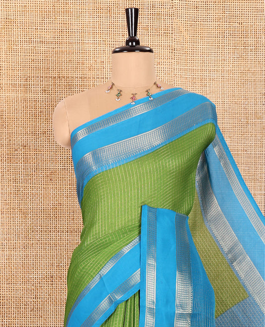 Green Moss Chiffon Saree Subtly Sparkled with Zari Checks All Over Its Body, Complemented by a Contrast Traditional Zari Design Border, Striped Pallu, and Paired with a Contrast Blouse