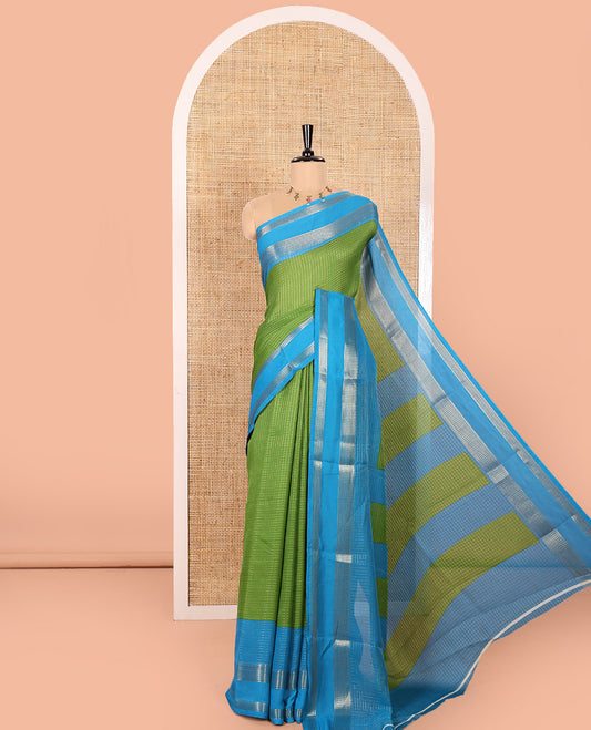 Green Moss Chiffon Saree Subtly Sparkled with Zari Checks All Over Its Body, Complemented by a Contrast Traditional Zari Design Border, Striped Pallu, and Paired with a Contrast Blouse