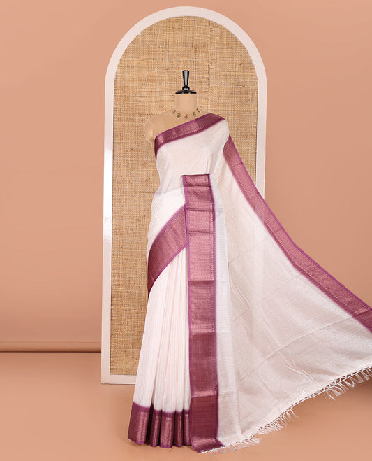 White and Purple Dola Silk Saree Embellished with Vertical Zari Stripes All Over the Body, Complemented by a Contrast Border of Traditional Zari Designs, Self-Pallu of Stripes, and Paired with a Contrast Blouse