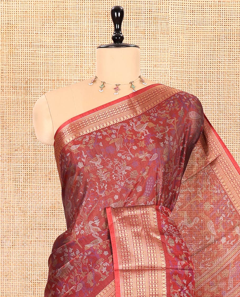 Maroon Dola Silk Saree Bedecked with Flora-Fauna Motifs Printed  All Over Its Body, Highlighted by Traditional Zari Design Border, Pallu of Paisley Motifs, and Paired with a Matching Blouse