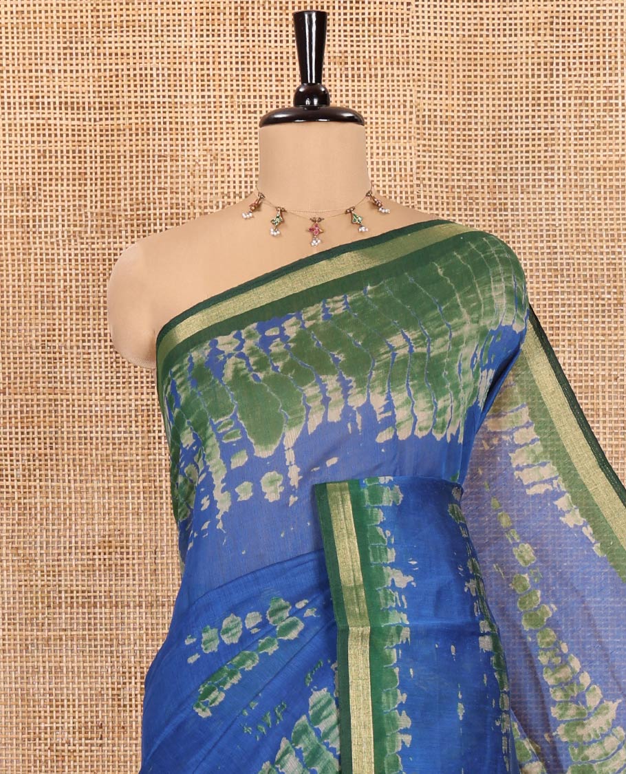 Blue Muslin Cotton Saree, Adorned with Marble-Textured Shibori Printed All Over Its Body, Subtle Piping Border, Pallu of Shibori Print, and Paired with a Contrast Blouse