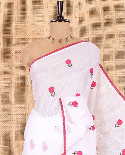 White Kota Chex Cotton Saree, Prettified with Tulip Motifs Embroidered on Its Body, Captivating Contrast Colored Lace Border, Pallu Mirrors the Same Embroidery, and Paired with a Matching Blouse