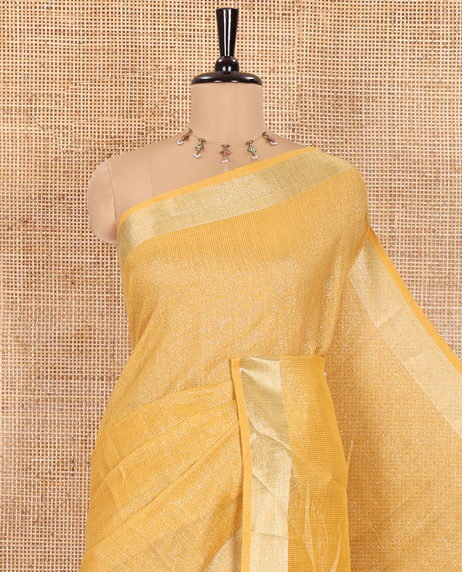 Yellow Tissue Saree, Gleamed Up with Zari Striped on Its Body, Highlighted by a Zari Border, Pallu Steeped with Zari Stripes, and Paired with a Matching Blouse