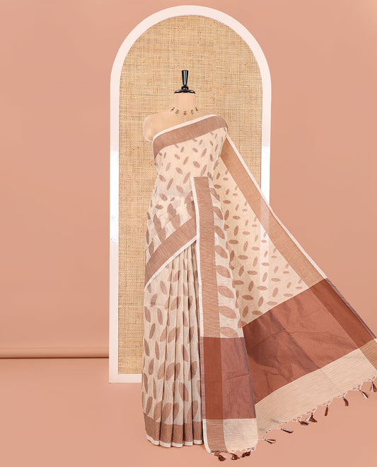 Chikku and Brown Manipuri Cotton Saree, Steeped with Leaf Motifs Printed on Its Body, Contrast Plain Border, Captivating Contrast Plain Pallu, and Paired with a Matching Blouse