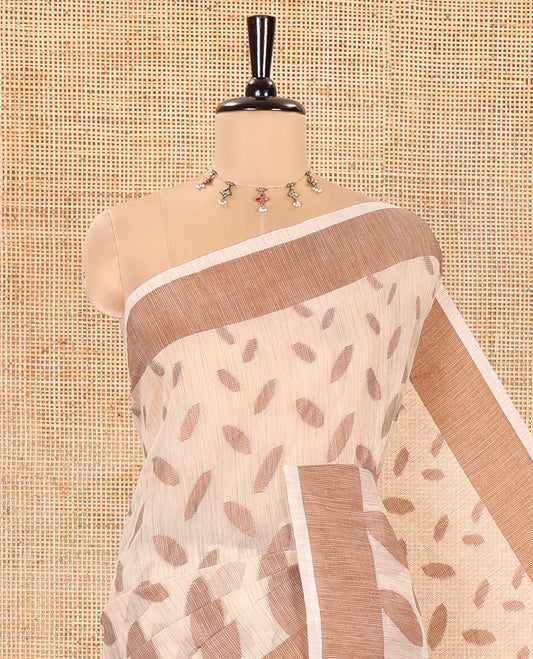 Chikku and Brown Manipuri Cotton Saree, Steeped with Leaf Motifs Printed on Its Body, Contrast Plain Border, Captivating Contrast Plain Pallu, and Paired with a Matching Blouse