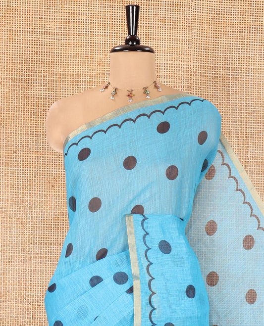 Blue Linen Cotton Saree, Beautified with Polka Dots All Over Its Body, Subtle Piping Border, Self-Pallu, and Paired with a Floral Printed Matching Blouse