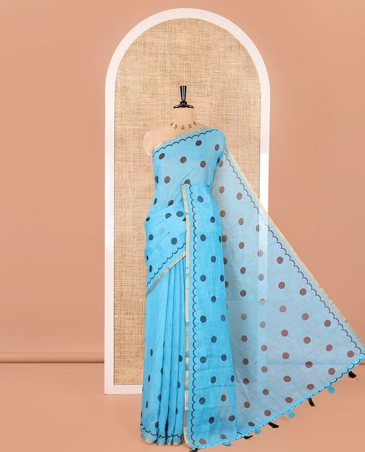 Blue Linen Cotton Saree, Beautified with Polka Dots All Over Its Body, Subtle Piping Border, Self-Pallu, and Paired with a Floral Printed Matching Blouse