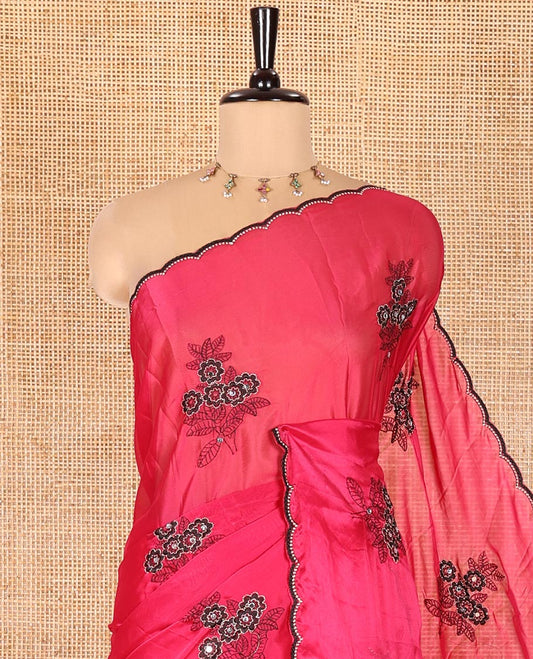 Magenta Rangoli Chiffon Saree, Bedecked with Flower-Style Motifs Embroidered on Its Body, a Subtle Scallop Embroidered Border, a Self-Pallu, and Paired with a Contrast Embroidered Blouse