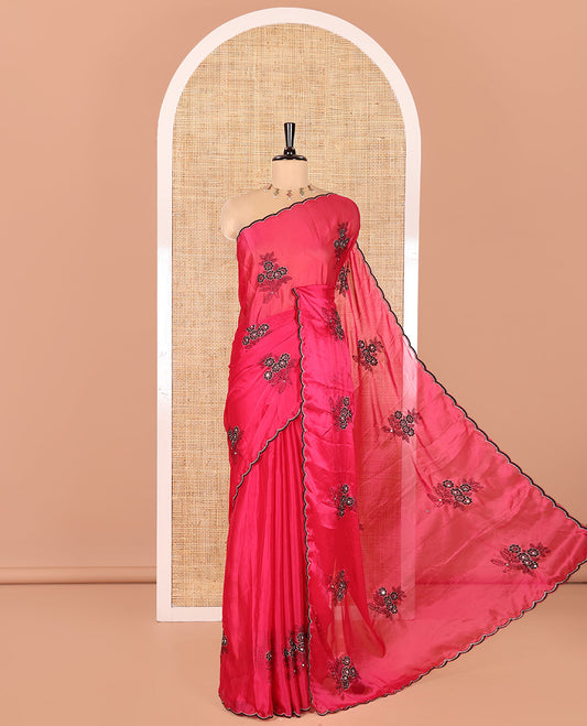 Magenta Rangoli Chiffon Saree, Bedecked with Flower-Style Motifs Embroidered on Its Body, a Subtle Scallop Embroidered Border, a Self-Pallu, and Paired with a Contrast Embroidered Blouse