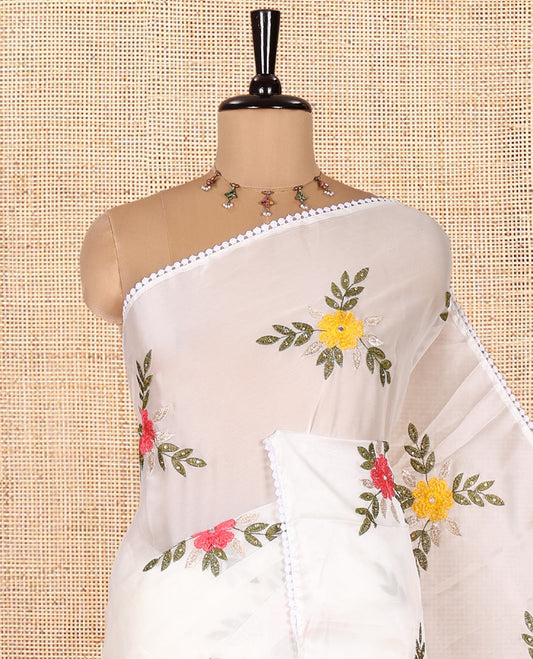 White Rangoli Chiffon Saree, Artfully Embroidered with Floral Motifs in Thread and Stone Work On Its Body, Subtly Sparkled with Lace Border, a Self-Pallu, and Paired with a Contrast Floral Embroidered Blouse