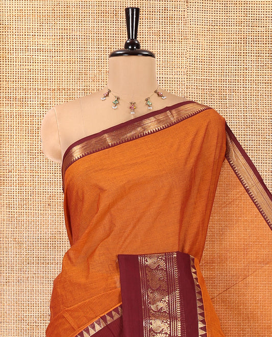 Rust Orange Plain Chettinad Cotton Saree, Contrast Rettai Pettu Temple-Peacock Border, a Self-Pallu, a Matching Blouse