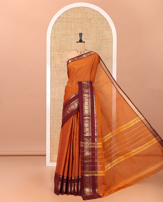 Rust Orange Plain Chettinad Cotton Saree, Contrast Rettai Pettu Temple-Peacock Border, a Self-Pallu, a Matching Blouse