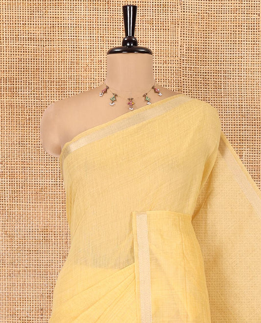 Yellow Plain Jamdani Cotton Saree, Highlighted by a Golden Zari Border, Pallu of Kashmiri-Style Weaving, and Paired with a Contrast Striped Blouse
