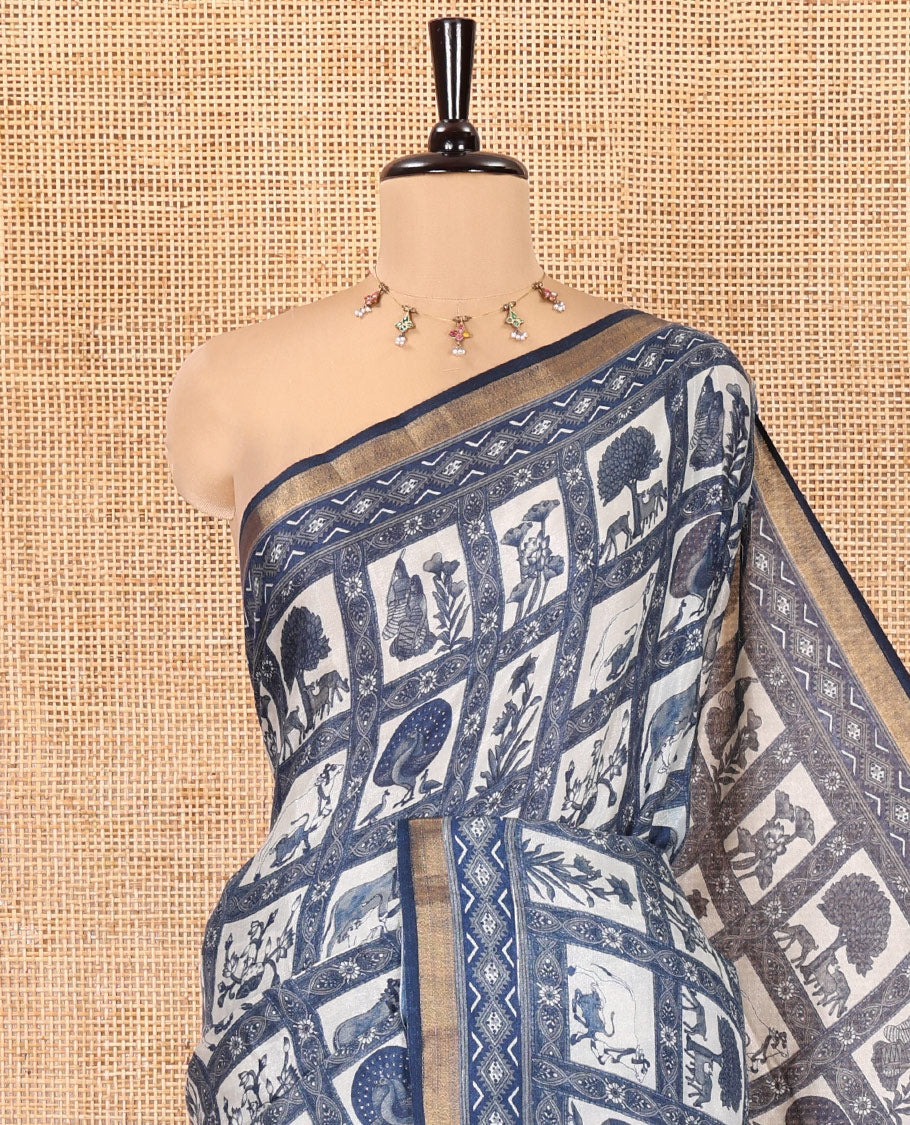 Indigo Blue Muslin Cotton Saree, Elevated with Flora-Fauna Motif Enclosed Checks on Its Body, a Subtle Zari Border, Striped Pallu, and Paired with a Matching Blouse