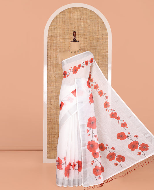 White-Red Linen Cotton Saree, Beautified with Floral Print, a Subtle Zari Border, and a Matching Blouse